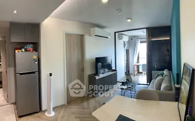 Modern living room with stylish decor and open layout in a contemporary apartment.
