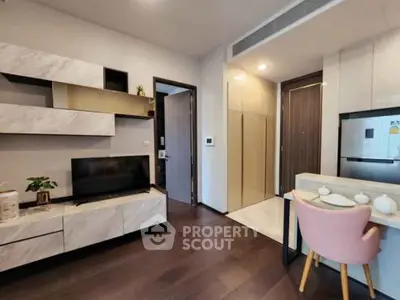 Modern living room with stylish furniture and open kitchen layout