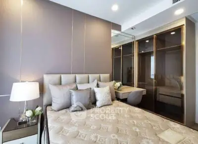 Luxurious bedroom with elegant decor and modern furnishings in a stylish apartment.