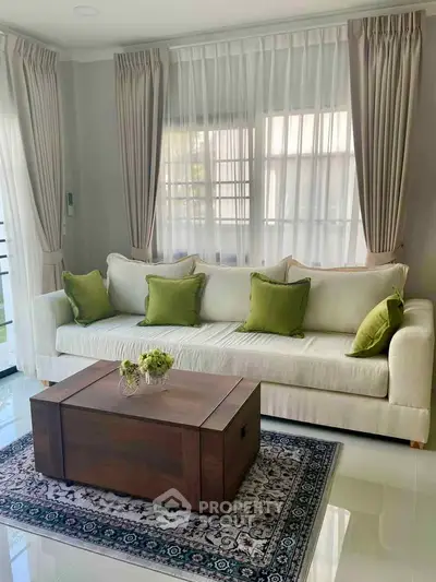 Elegant living room with stylish sofa and wooden coffee table, perfect for modern home decor.