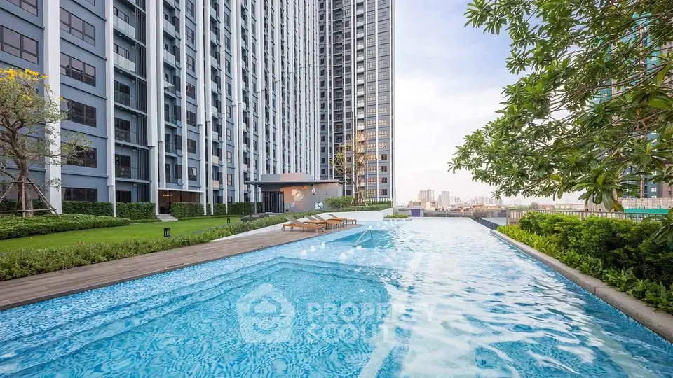 Luxurious high-rise apartment with stunning pool and lush greenery, perfect for modern urban living.