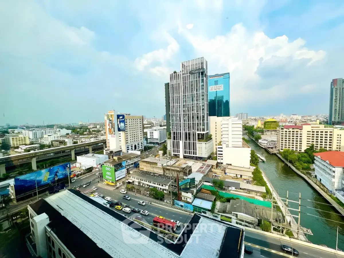 Stunning cityscape view from high-rise building with vibrant skyline and bustling streets below.