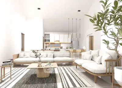 Spacious modern living room with open kitchen and stylish decor