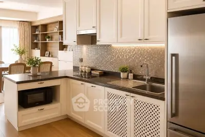 Modern kitchen with sleek cabinetry, stainless steel appliances, and elegant dining area.