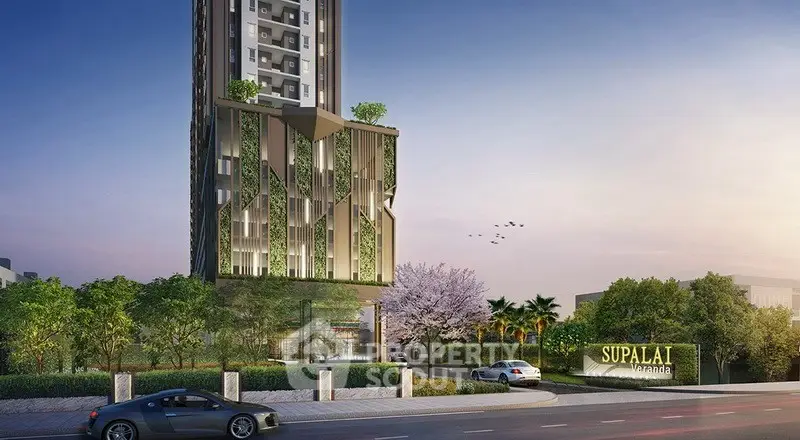 Modern high-rise building with lush greenery and sleek design in urban setting.
