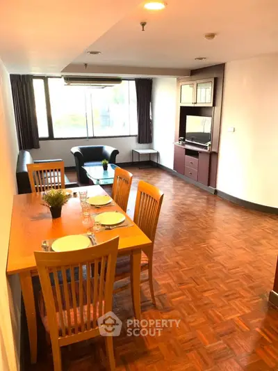 Spacious living room with dining area and modern furnishings