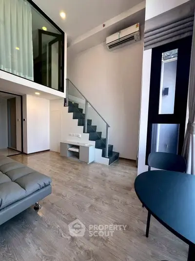 Modern living room with sleek design and stylish furniture