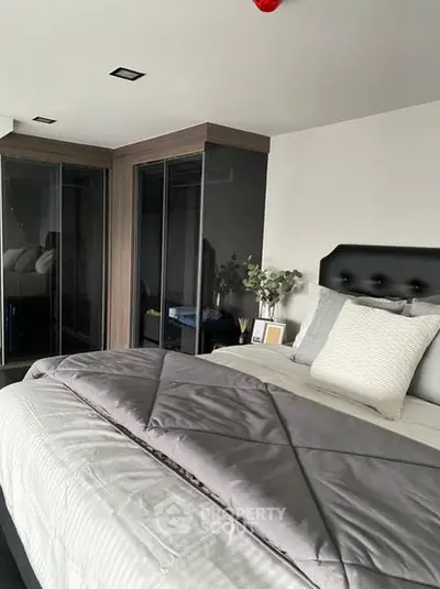 Luxurious bedroom with modern decor and stylish bedding