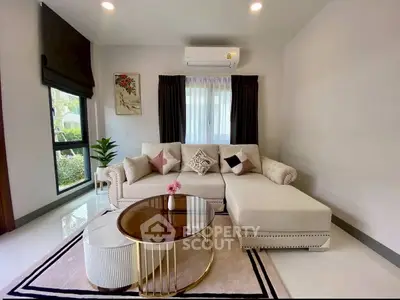 Modern living room with stylish furniture and elegant decor