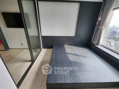 Modern bedroom with city view and sleek design