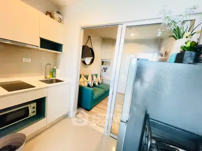 Modern kitchen with open layout and cozy living room view