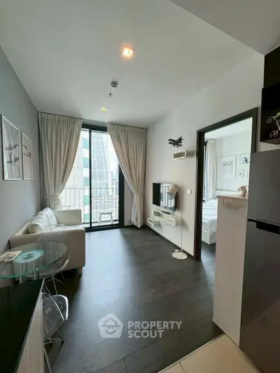 Modern living room with balcony view in stylish apartment