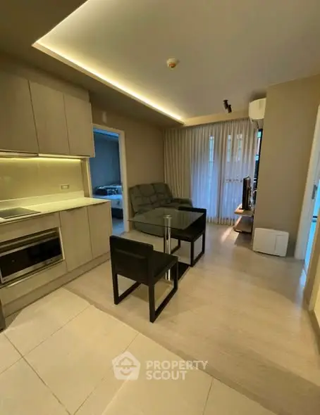 Modern living room with sleek furniture and ambient lighting