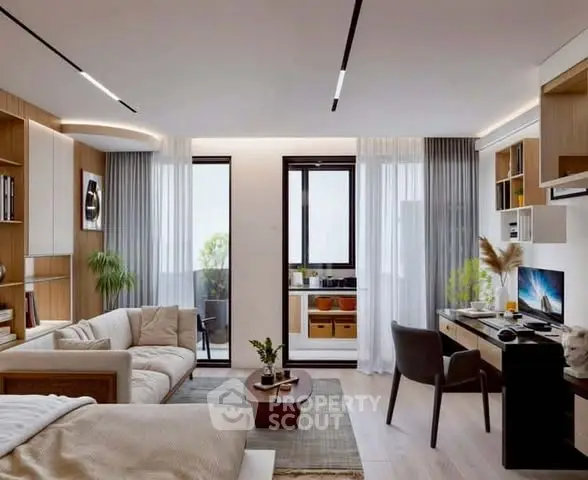 Modern living room with stylish decor and home office setup, featuring large windows and natural light.