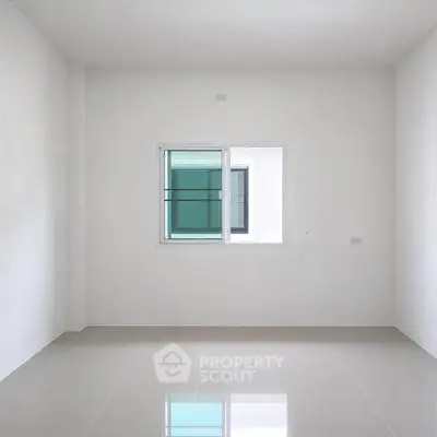 Minimalist empty room with tiled floor and single window, perfect for customization.
