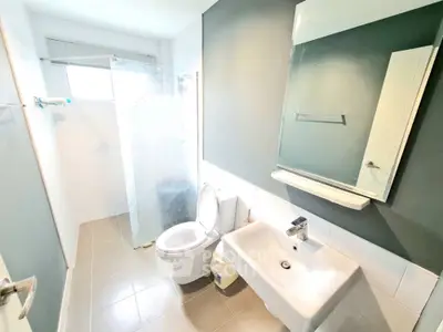 Modern bathroom with sleek design and glass shower enclosure