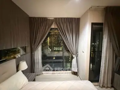 Luxurious bedroom with stunning city view and elegant curtains