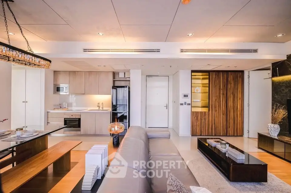 Luxurious modern living room with open kitchen and stylish decor