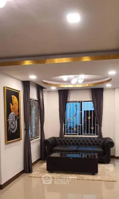 Elegant living room with stylish decor and modern lighting