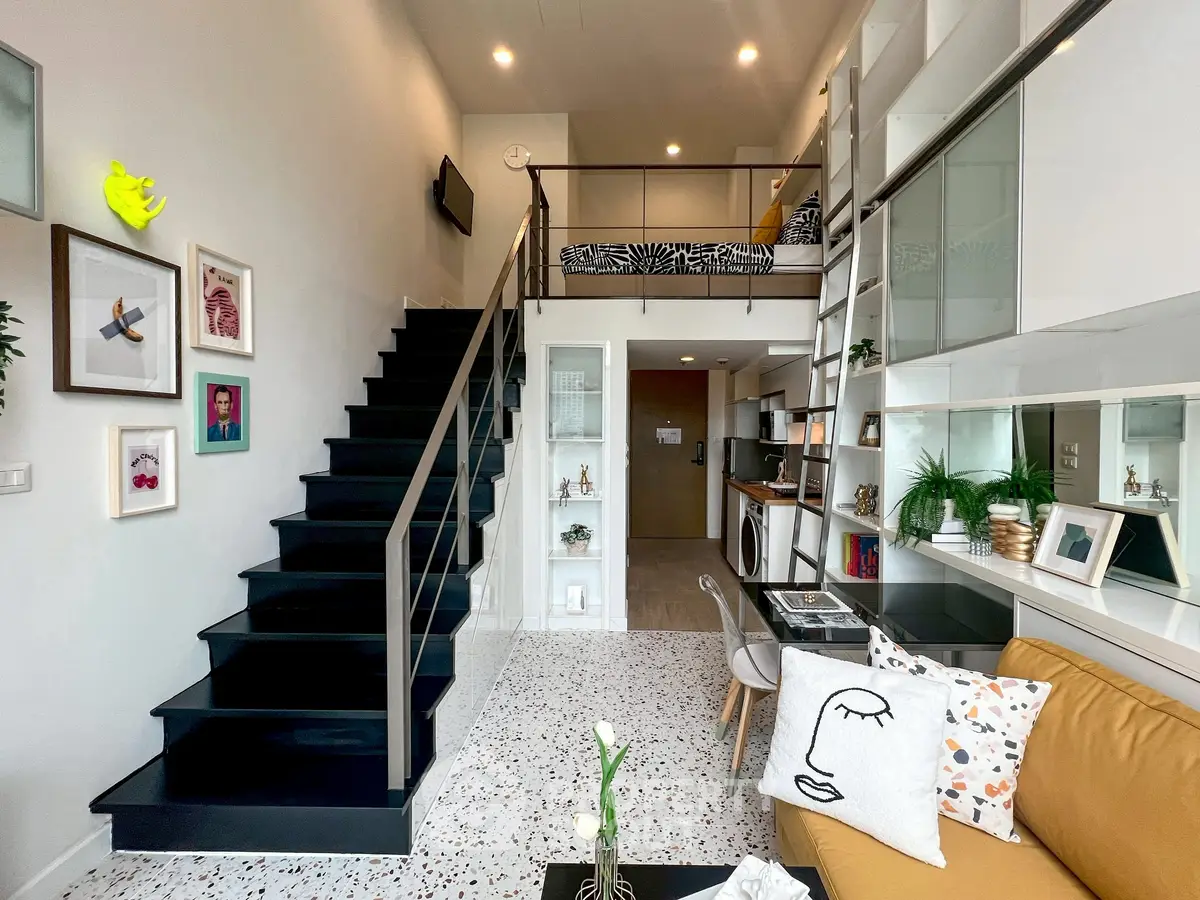 Modern loft apartment with stylish decor and mezzanine level