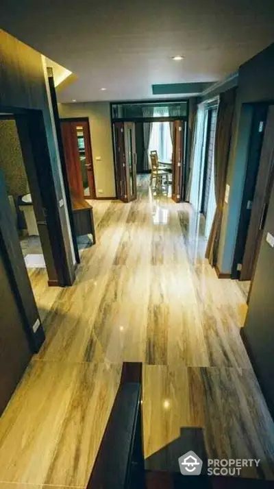 Luxurious hallway with elegant wooden flooring and modern design