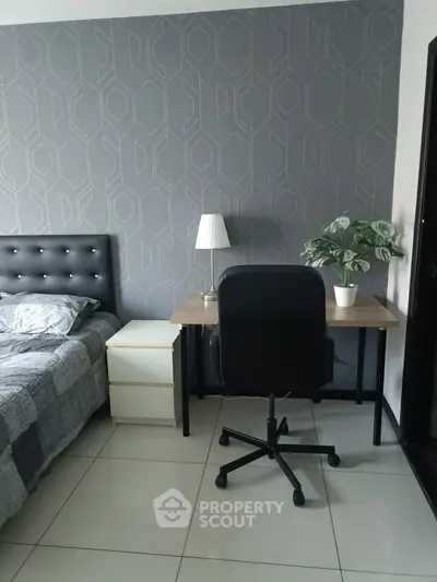 Modern bedroom with study desk and stylish decor