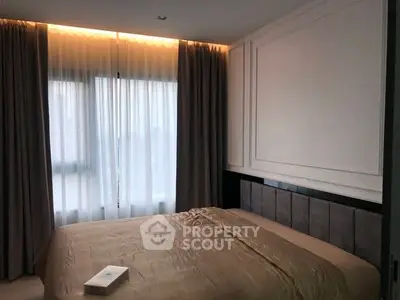 Cozy bedroom with elegant curtains and soft lighting