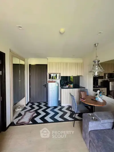 Modern apartment interior with stylish kitchen and cozy dining area