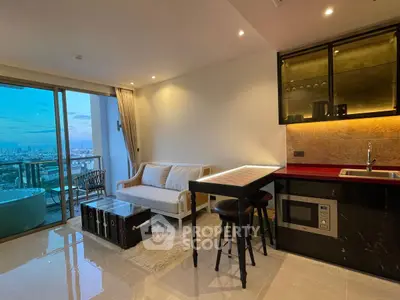 Modern open-plan living room with stunning city view and sleek kitchen design.