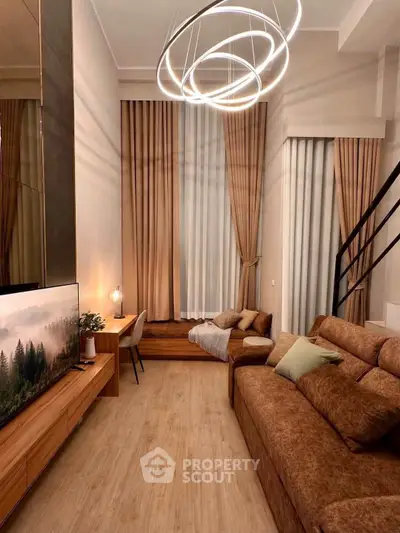 Luxurious modern living room with high ceilings and elegant lighting