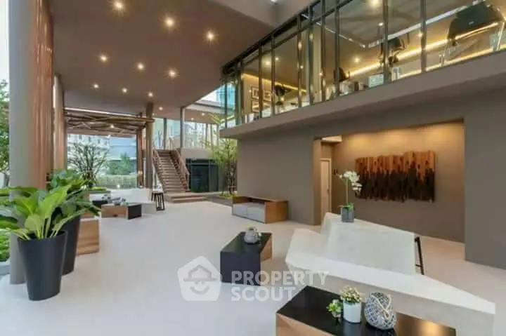 Luxurious modern living space with high ceilings and elegant decor