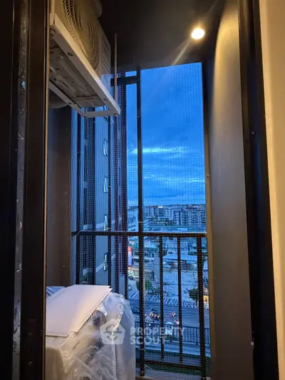 Charming balcony with city view, perfect for relaxation and enjoying urban scenery.