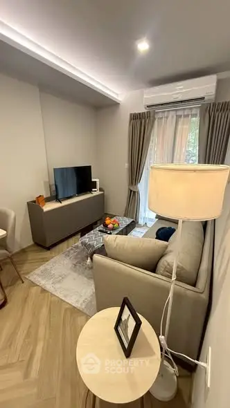 Modern living room with cozy sofa and stylish decor