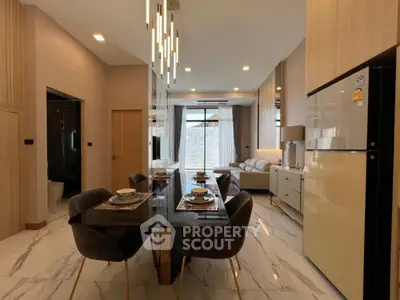 Luxurious modern living room with elegant dining area and stylish decor