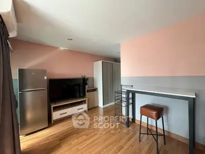 Modern living room with stylish furniture and sleek appliances