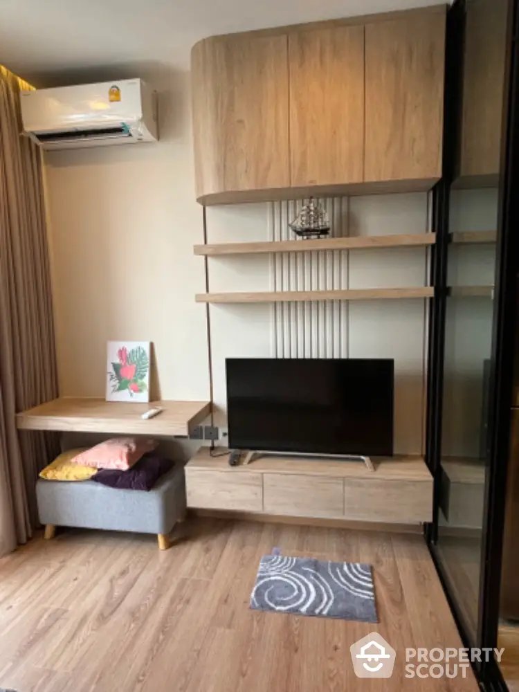 Modern living room with stylish wooden TV unit and cozy decor