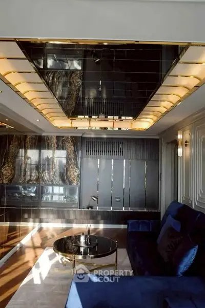 Luxurious living room with elegant decor and modern lighting