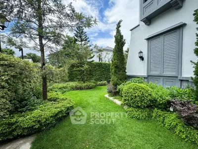 Beautifully landscaped garden with lush greenery and modern exterior design