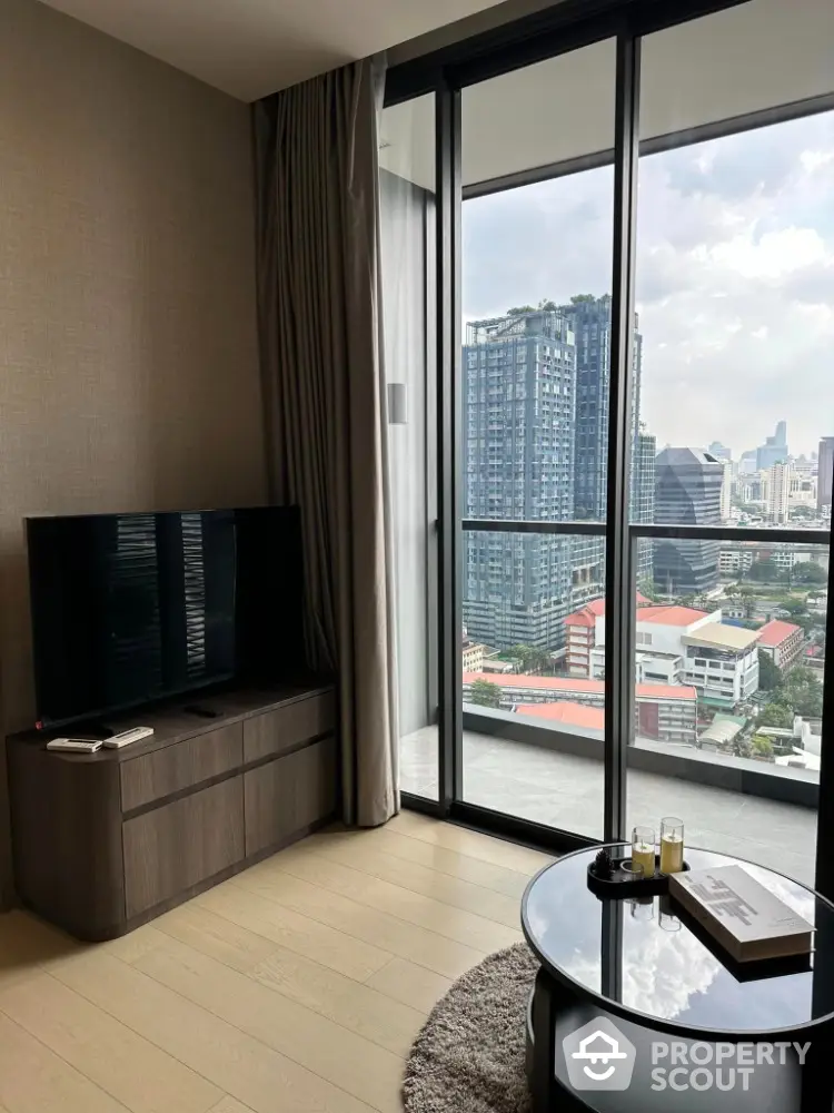 Modern living room with city view and sleek furniture