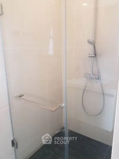 Modern bathroom with sleek shower design and glass enclosure