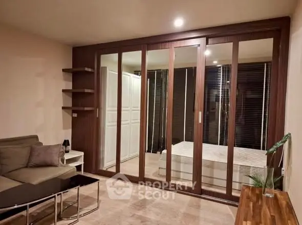 Modern living room with glass sliding doors and cozy furniture
