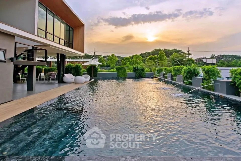 Luxurious modern home with stunning pool and sunset view