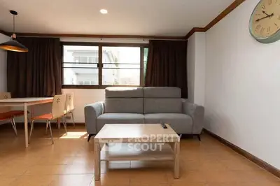 Spacious living room with modern furniture and natural light