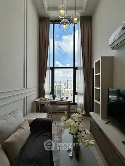 Luxurious high-ceiling living room with stunning city view and modern decor.