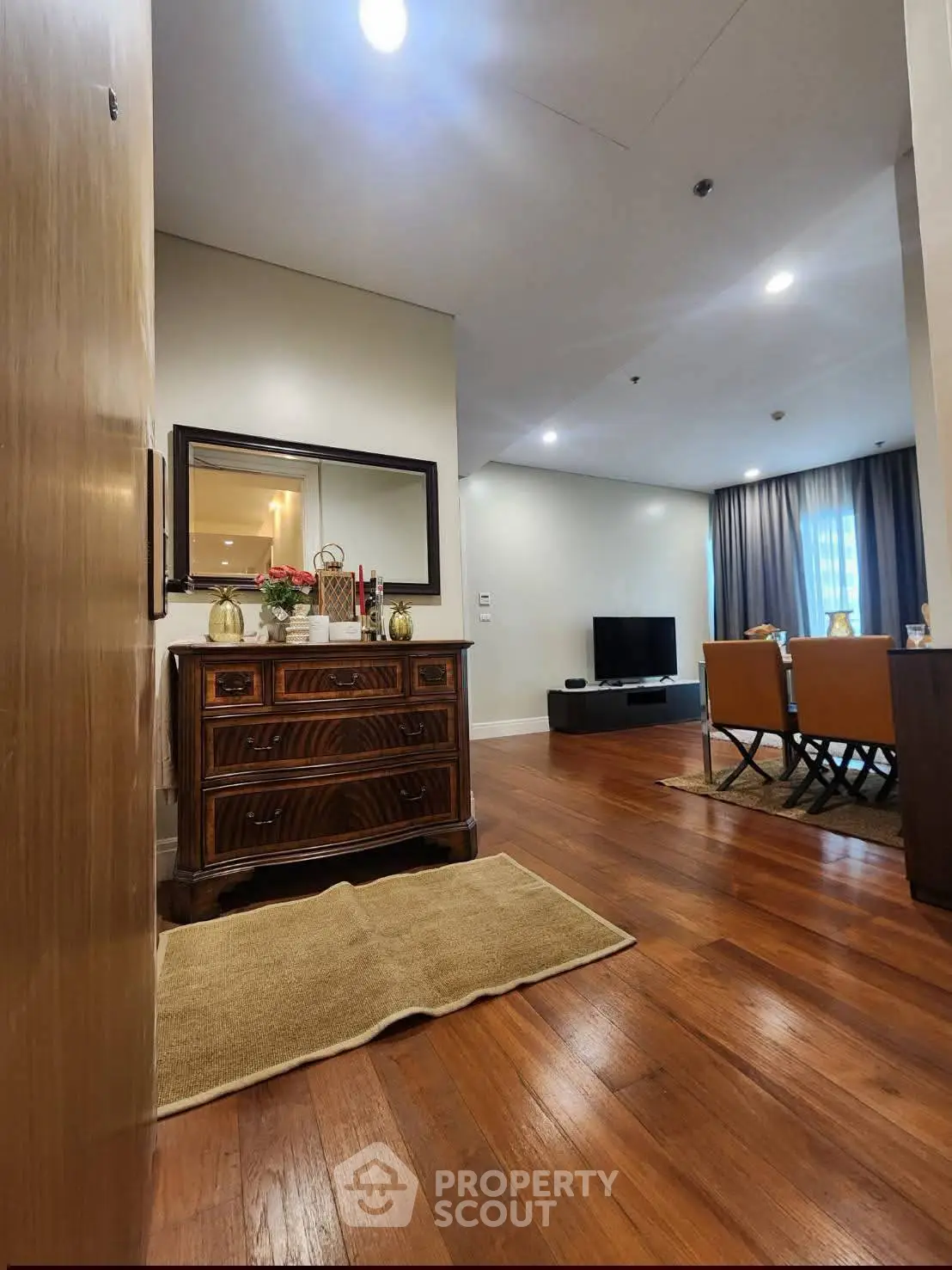 Elegant living room with wooden flooring and modern decor