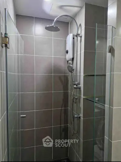 Modern bathroom with sleek shower design and glass partition