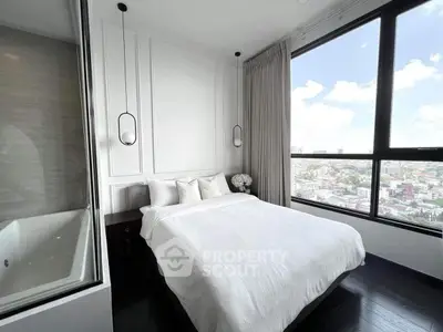 Luxurious bedroom with stunning city view and elegant decor
