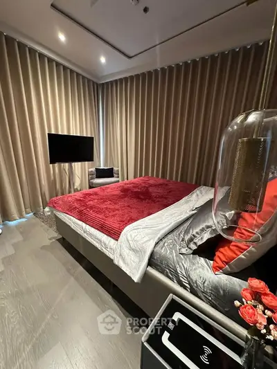 Luxurious bedroom with modern decor and elegant lighting