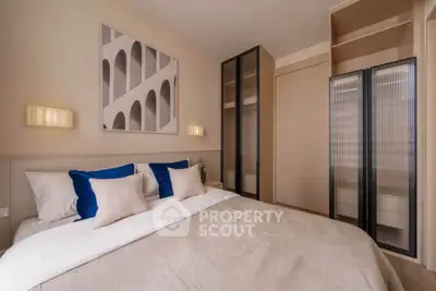 Elegant bedroom with modern decor and ample storage space