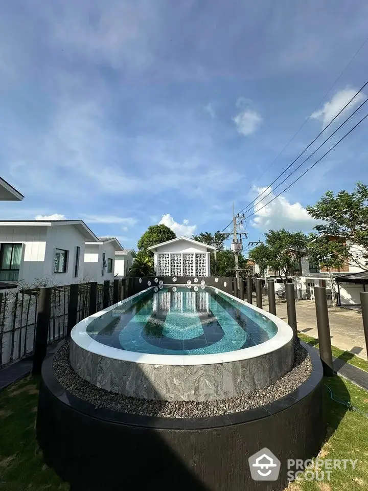 Stunning modern pool with sleek design in a luxurious residential area